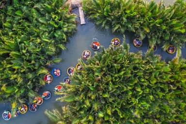Leer varen in een bamboeboot (Hoi An)